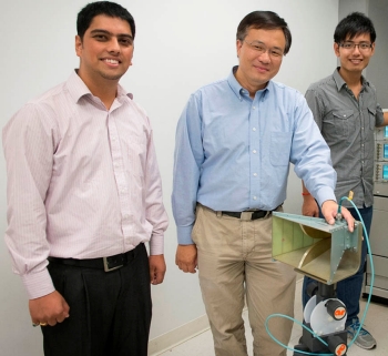 Doctoral candidate and CAC research assistant Saurav Subedi with Research Professor Yimin Zhang, PhD, and doctoral candidate Si Qin.