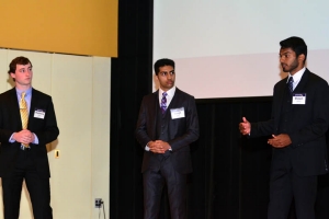 Juniors Matthew Myers CpE, Sanjit Singh EE and Shawn Vettom CpE present Vivify to VSEC judges; their app took third place. 