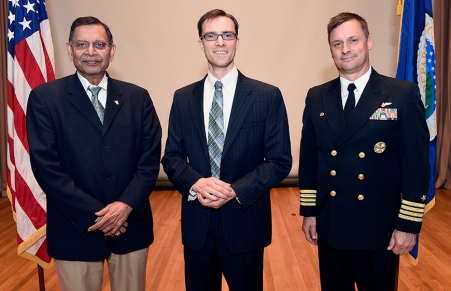 From the U.S. Naval Research Laboratory, Dr. Bhakta B. Rath, Associate Director of Research for Materials Science and Component Technology; Dr. Colin D. Joye, PCASE recipient and electrical engineer; and Captain Mark C. Bruington, U.S. Navy, 38th Commanding Officer.