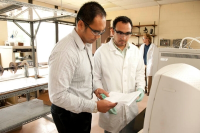 Assistant Professor of Chemical Engineering Justinus Satrio, PhD, works with then-doctoral student Rene Garrido, PhD, in the College’s Biomass Resources & Conversion Technologies Lab.
