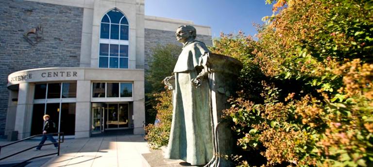 image showing the Mendel statue and Mendel Science Center on Villanova campus