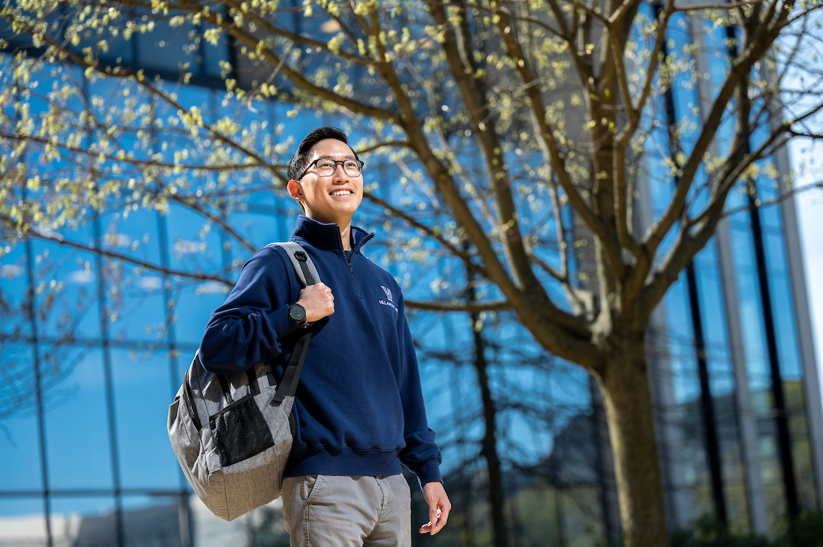 man with backpack outside