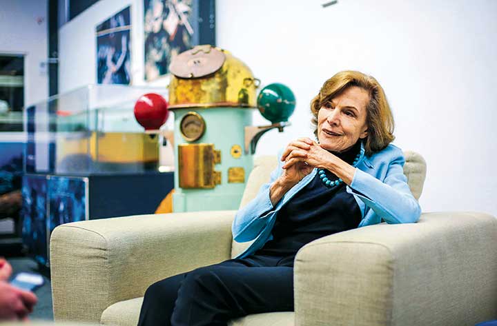 Sylvia Earle sitting in an armchair