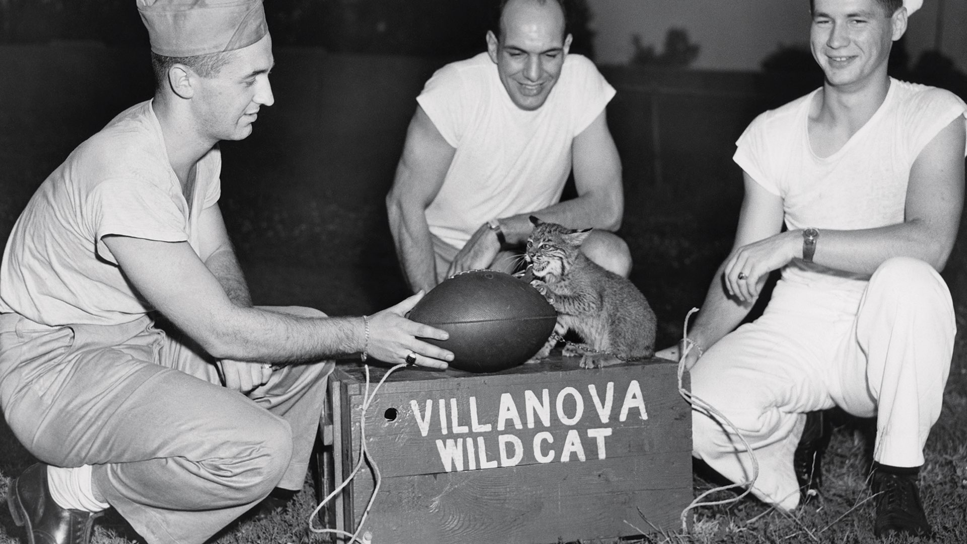 Bob Austin, Clyde Cobb and James Halpin Junior with Count Villan II, Villanova mascot, in summer 1945.