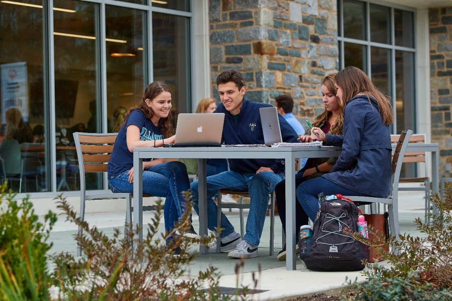 Students sitting on Bartley Patio