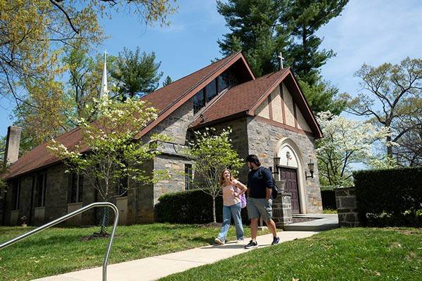 Cabrini Health Services building with students walking in front