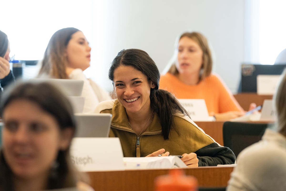 Female sudent smiling in class