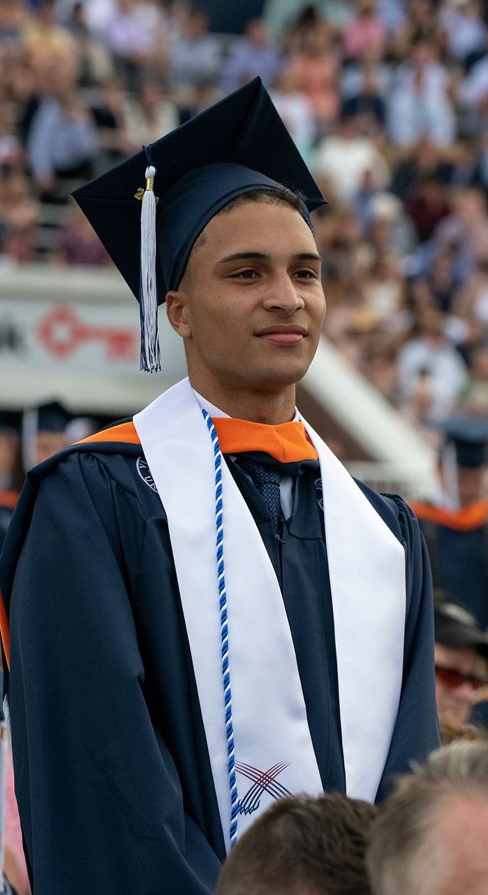 A student stands during Villanova's commencement ceremony.