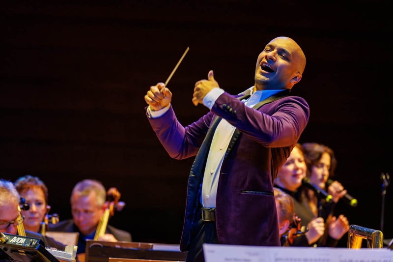 pops Christopher Dragon of the Philly Pops conducting on stage