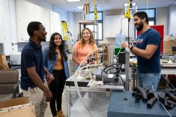 Students and professor in the lab