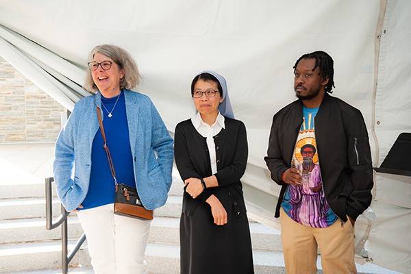 From left, the Rev. Rebecca Irwin-Diehl '23 PhD, Sister Theresa Dung Trang, LHC, '23 PhD and Andre Price '23 PhD
