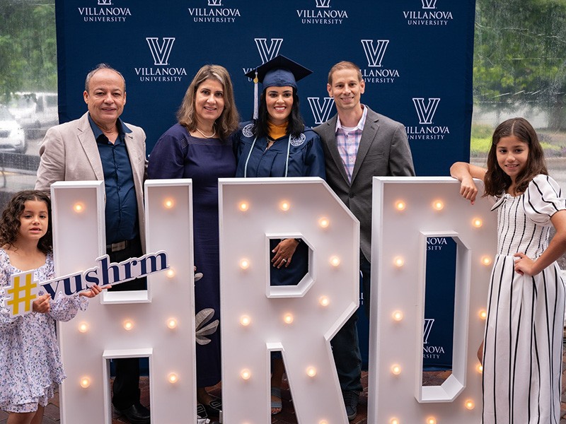 Ligia Vail '24 MS graduated this May from the Villanova master's degree program in Human Resource Develpment. (From left): daughter Isabel; father, Jairton Ribeiro; mother, Elena Ribeiro; Vail; husband, Ted; and daughter Elena.