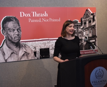 Associate Professor Whitney Martinko, PhD, address those gathered at the opening reception of Dox Thrash: Painted, Not Printed, in the Villanova University Art Gallery