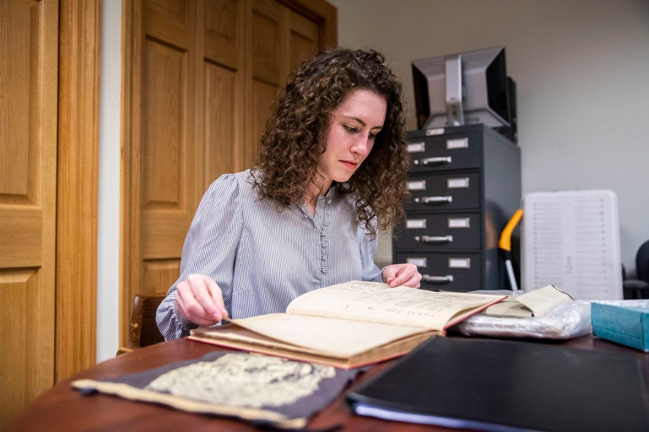 Angelina Lincoln ’18 CLAS, ’20 MA, doing archival research. Photo by the Philadelphia Inquirer.