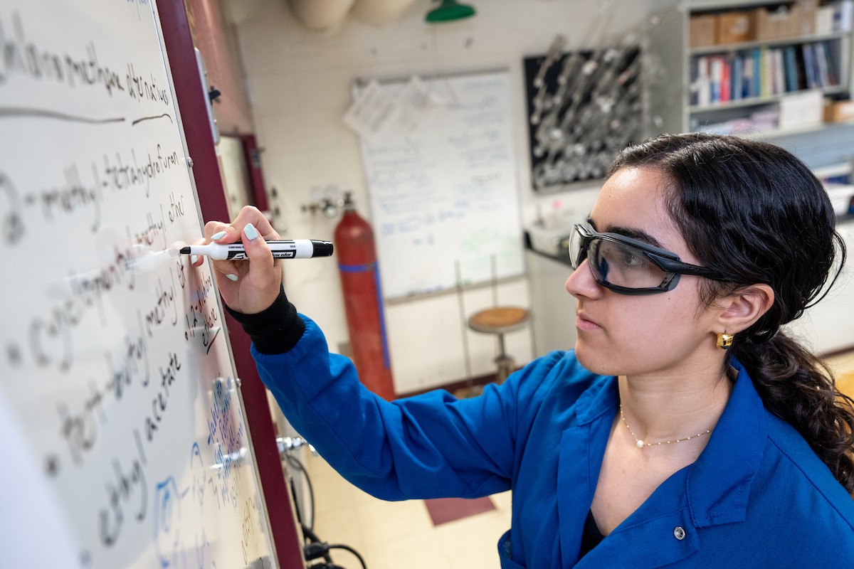 science-lab A Villanova graduate chemistry student writes on a board in a lab.