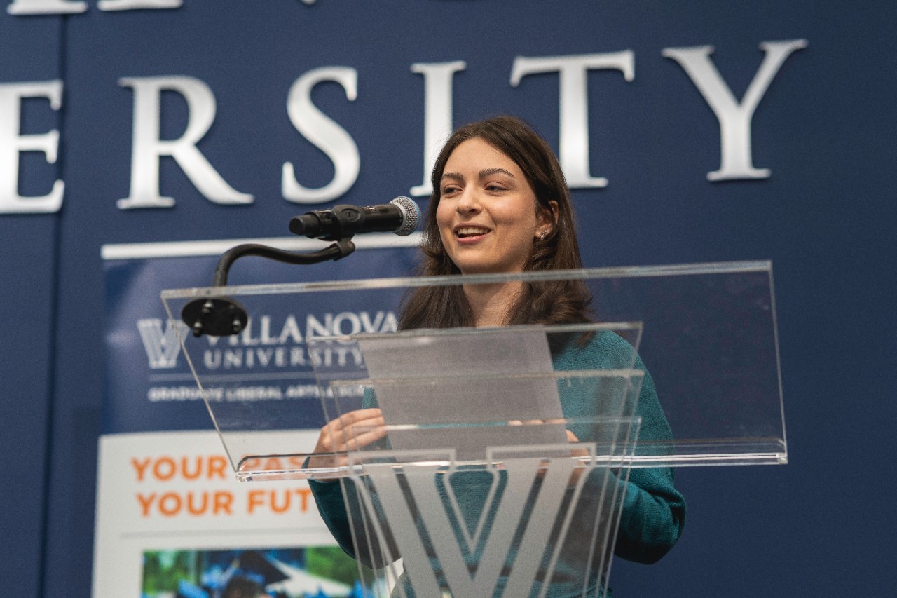 Graduate student presenting her work at the CLAS research symposium