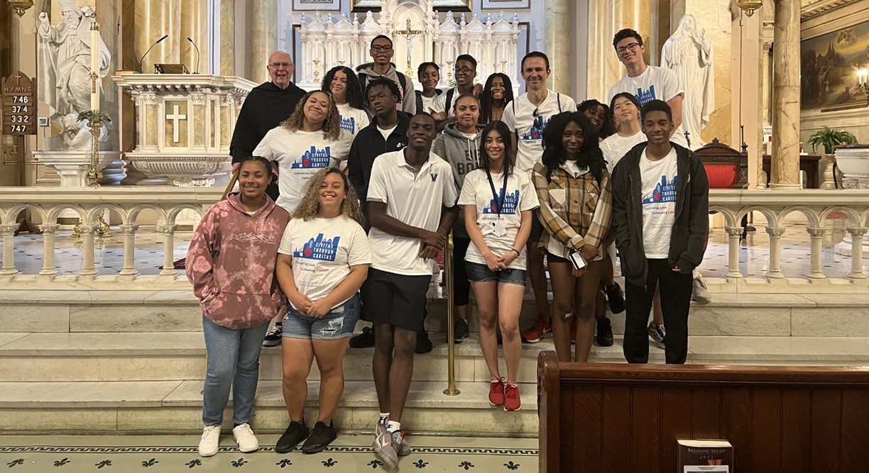 The summer 2022 student participants pose for a group picture in St. Thomas of Villanova church.
