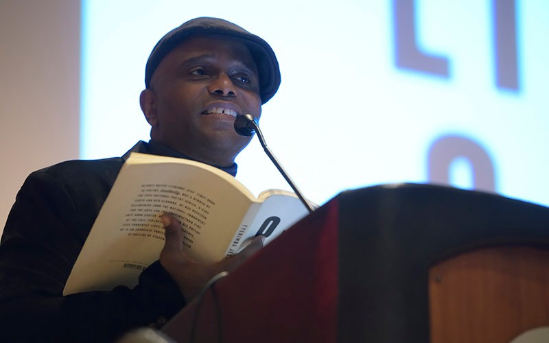 Tyeimba Jess performs a poetry reading at Villanova University.