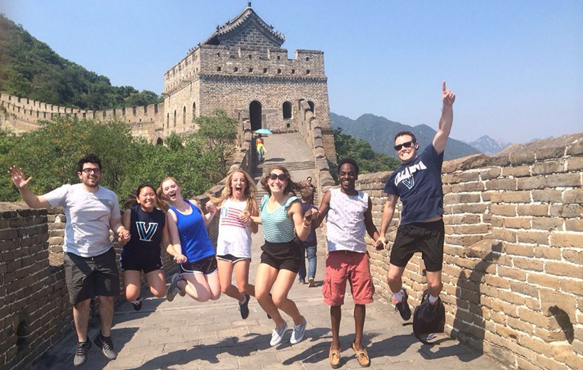 Villanova students stand on the Great Wall of China.