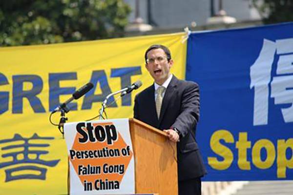 Professor Mark speaking at a rally in DC.