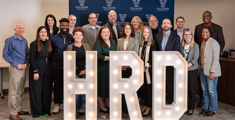 Villanova HRD faculty standing together at a retreat