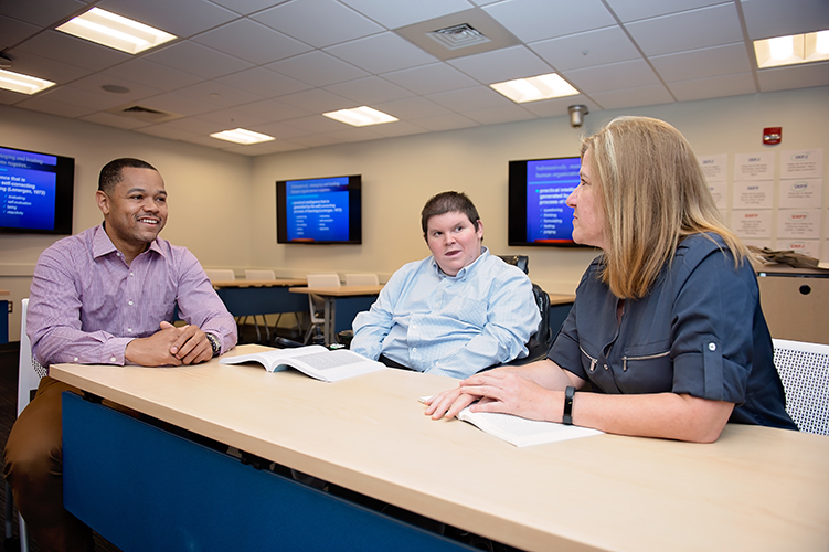 Public Administration students talking in class