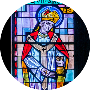 Stained glass artwork of St. Thomas of Villanova