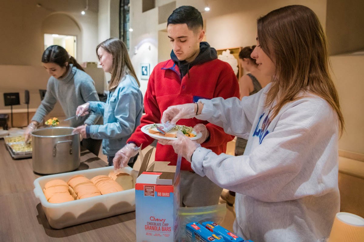 Students volunteering at a food kitchen