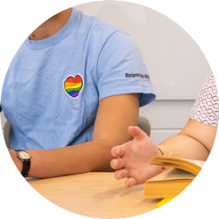 A student with an LGBTQ+ t-shirt