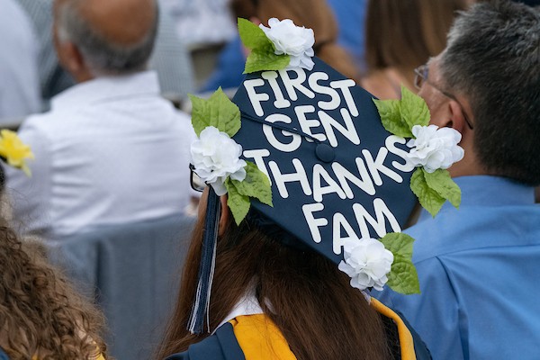 A Student Wears a Graduation Cap Thanking Her Family