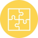 Icon of four puzzle pieces connecting to make a square.