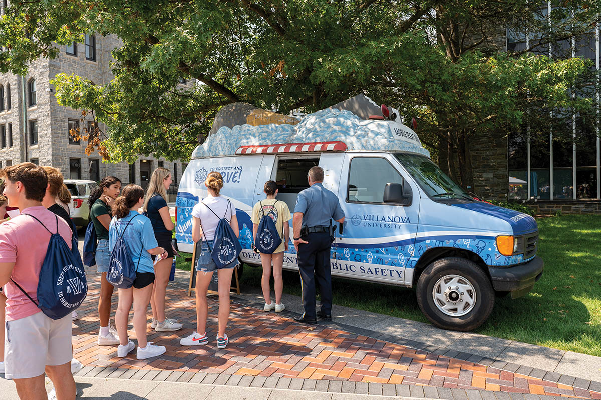 Students gathering outside an ice cream truck
