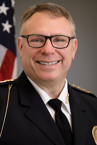 Dave Tedjeske smiling in uniform