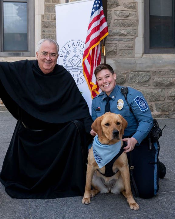 Father Peter, Taffy and her owner Amy Lenahan