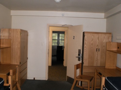 View of two desks and two wardrobes in a Moriarty Hall double room.