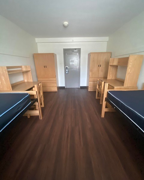 View of two desks and two wardrobes in a Moriarty Hall double room.