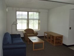 View of the living room of a standard 4-bedroom apartment.
