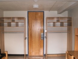 View of open closets in a Stanford Hall double room.