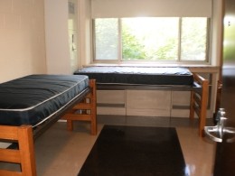 View of two beds in a Sullivan Hall double room.