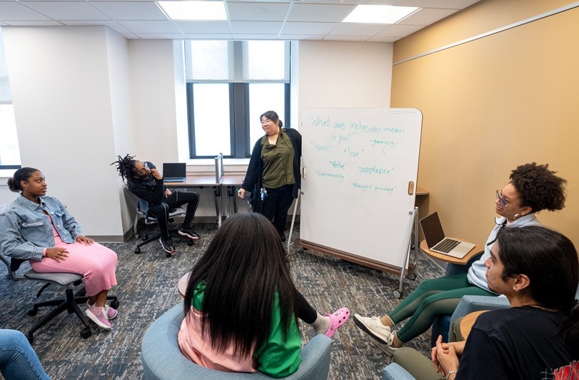 Students learn in a breakout room in the SUITE