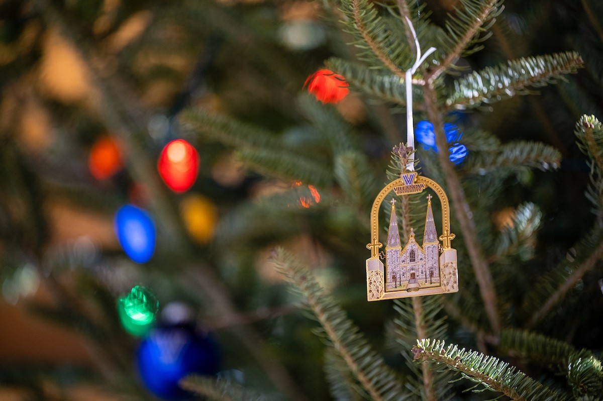 A Villanova ornament hangs on a Christmas Tree