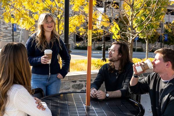 Ryan Stocker talking with classmates