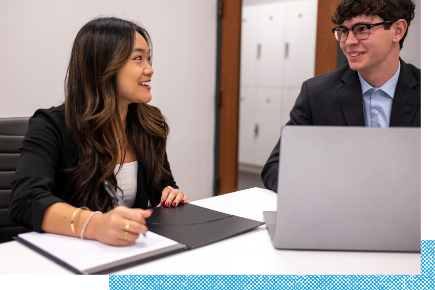 Students working in a conference room.