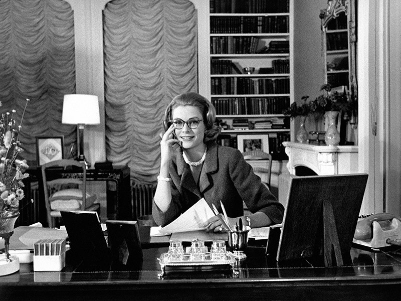 A photo of Princess Grace of Monaco sitting in her library in the Kelly House in East Falls, Philadelphia.