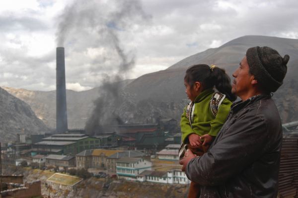 man and child looking at pollution