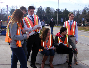 Rachel Antonio, James Matzke, Robert Flynn, Diana Chiavetta, Dylan White, and Evan Campbell conduct traffic counts at an intersection