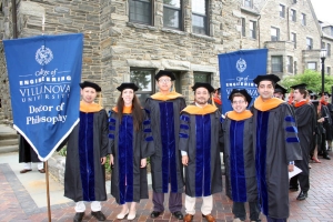 Engineering PhD graduates. Ronald Warzoha (second from right) and Ali Jalali (far right) won the College’s Outstanding Doctoral Student Awards.