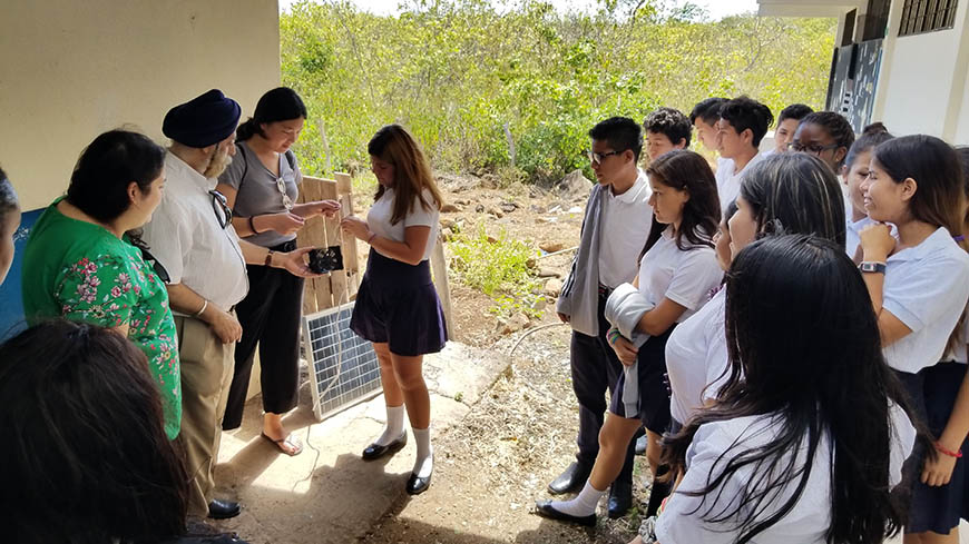 Dr. Pritpal Singh and undergraduate Sarah Chen taught students at the Ignacio Hernandez school about solar energy.