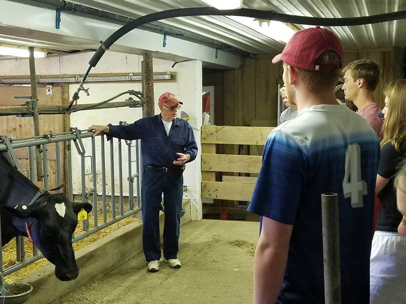 Sam Matthews, co-owner of Milky Way Farm, provided the students with valuable insight into the dairy farm business in the 21st century. 
