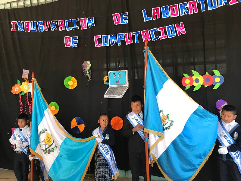 Children celebrate the opening of their new computer lab.